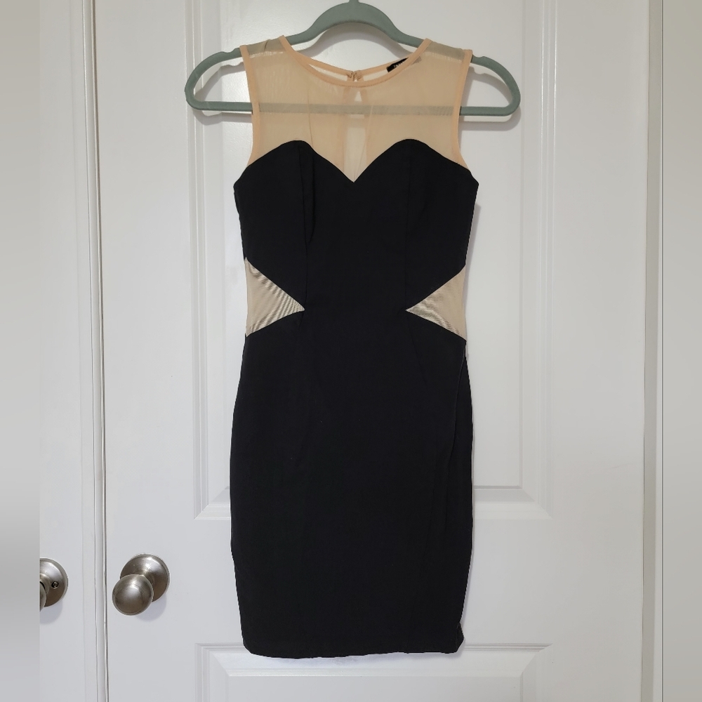 Elegant Black and Cream Sleeveless Dress